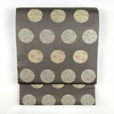 中古）袋帯 グレージュ セミフォーマル 六通 草木染 織り 引き箔 丸に花 絹